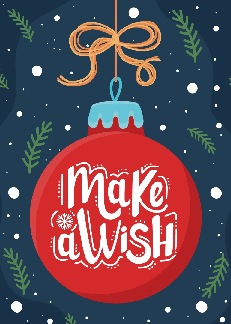 Red Christmas ornament with Make a Wish lettering on a snowy navy background and foliage.