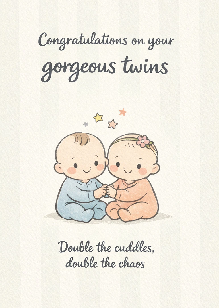 Baby boy and girl twins sit together beneath congratulations and cuddles wording on cream card.