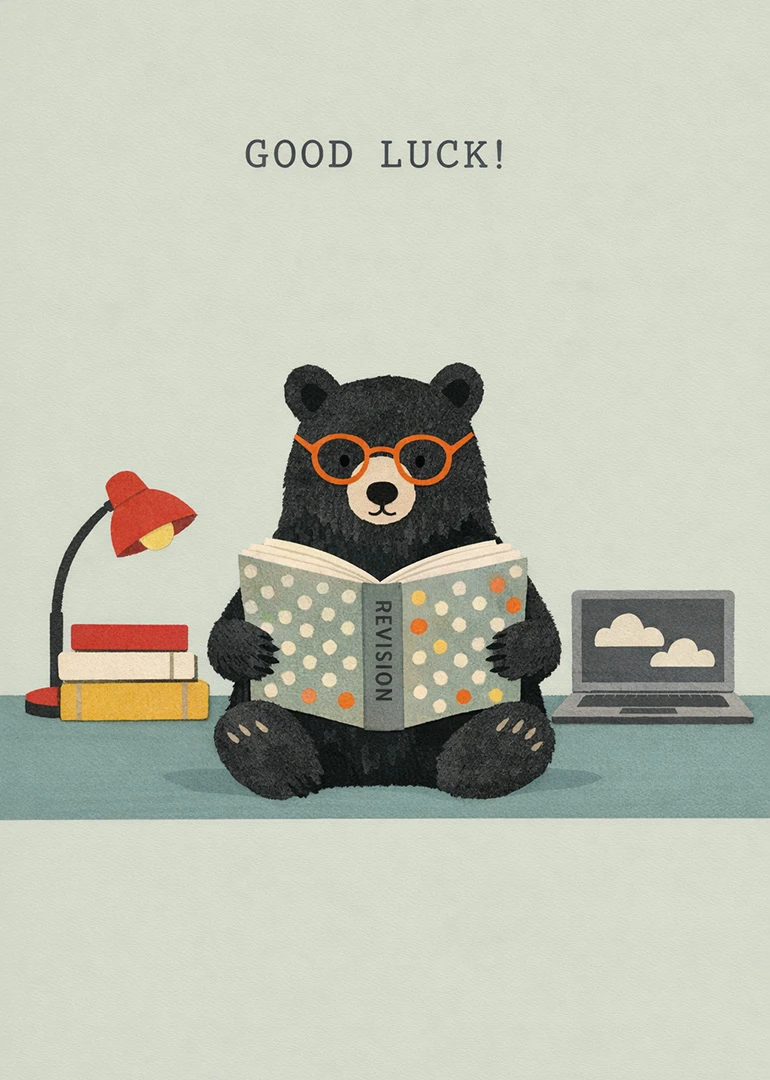 Black bear with glasses studies revision book beside lamp, books and laptop with Good Luck.