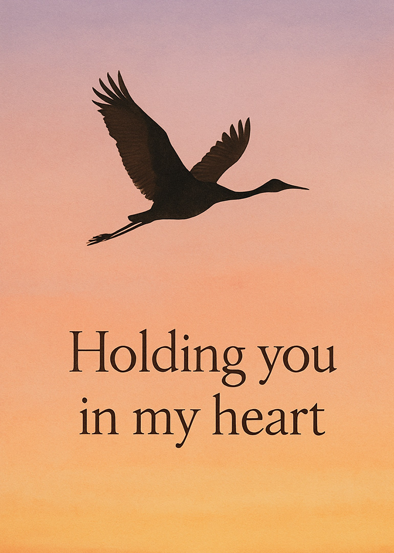 Silhouette of bird flying against a soft sunset background with loving message