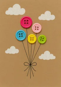 Five colorful button balloons float under glittery clouds on a kraft paper handmade card background.