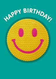 Yellow smiley face with pink features and happy birthday text