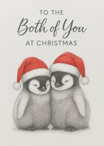 Two fluffy penguin chicks wearing Santa hats cuddle beneath Christmas wording on a grey card.