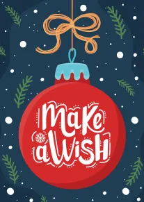Red Christmas ornament with Make a Wish lettering on a snowy navy background and foliage.