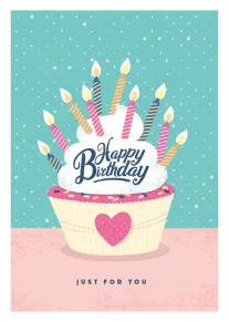 A birthday cupcake with candles and Happy Birthday text on turquoise and pink speckled background.