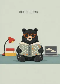 Black bear with glasses studies revision book beside lamp, books and laptop with Good Luck.