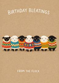 Birthday card with seven colorful sheep wearing sweaters