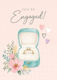 Engagement ring in blue box with flowers and hearts