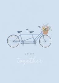 Blue tandem bicycle with flowers and better together text