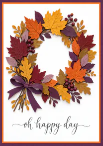 A colourful autumn leaf wreath with berries and a purple bow, above the words “oh happy day”.