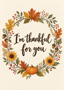 Autumnal botanical wreath with pumpkins, acorns, sunflowers and the message “I’m thankful for you”.