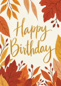 Cream birthday card with gold Happy Birthday lettering framed by illustrated autumn leaves.