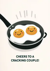 Two smiling fried eggs in a pan with text cheers to a cracking couple below.
