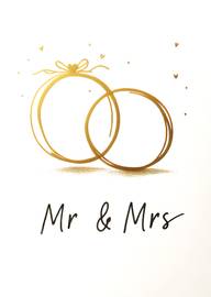 Elegant gold wedding rings with Mr and Mrs text card