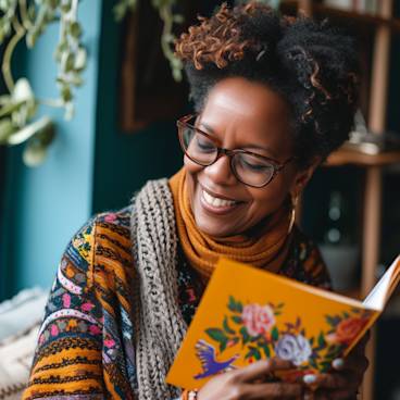 Joyful person chuckling while reading a funny 60th birthday card