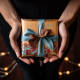 Photograph of a person holding a beautifully wrapped dinner party gift