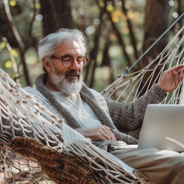 A relaxed new retiree lounging in a hammock with a laptop, humorously planning their next Netflix marathon.