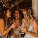 Friends celebrating a 21st birthday with laughter and toasts