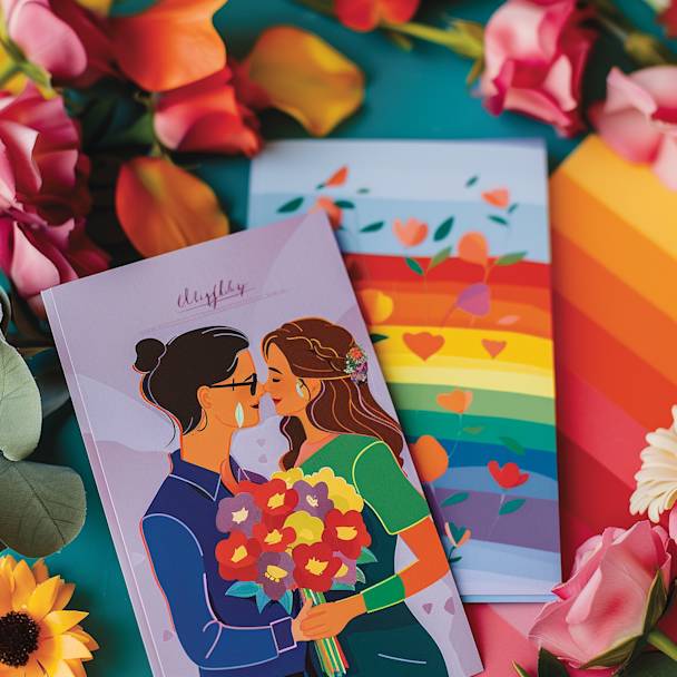 A selection of LGBTQ+ inclusive wedding cards featuring rainbows and a diverse couple